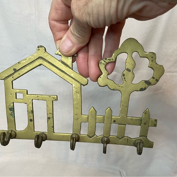 Vintage solid brass wall key holder. Design is of a home, picket fence and tree. - Picture 3 of 9